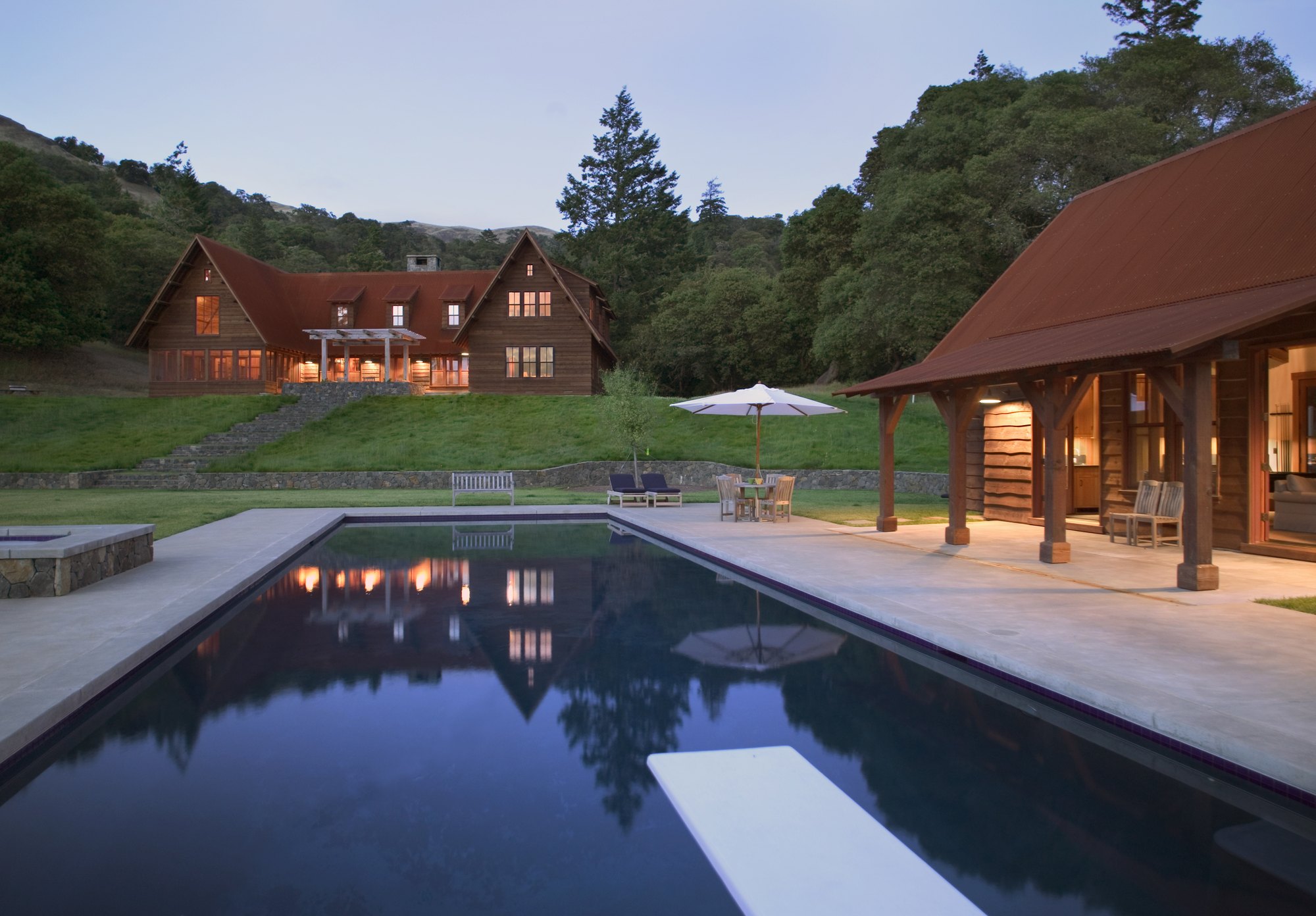 High Rock Ranch exterior glowing at dusk